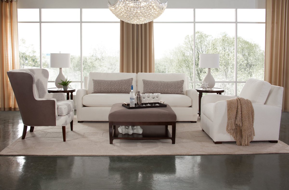 Arlington Seating looking chic! Available in any fabric and finish-  with or without slipcovers. 

Also shown: Tredwell Wing Chair and Hammond Cocktail Ottoman.