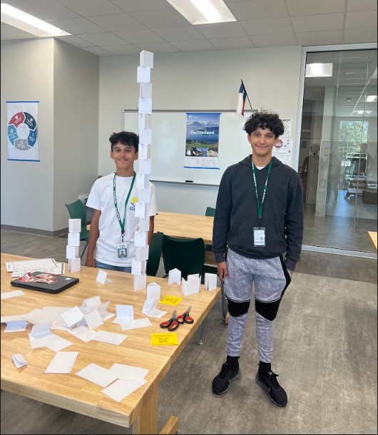 CTENCISD's tweet photo. West Fork High School Principles of Architecture students prototyped, designed, and built the tallest tower they could using just 100 index cards and scissors. No glue or tape allowed! How tall do you think they went? #NCISDconneCTEd #gogators #WFHS #buildingtheirfuture https://t.co/PJqOHCVshl