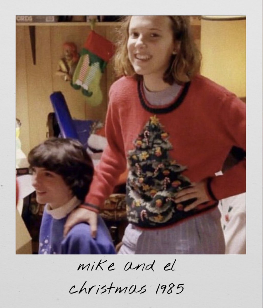 strngerpolaroid's tweet image. a polaroid of mike and el 
christmas 1985