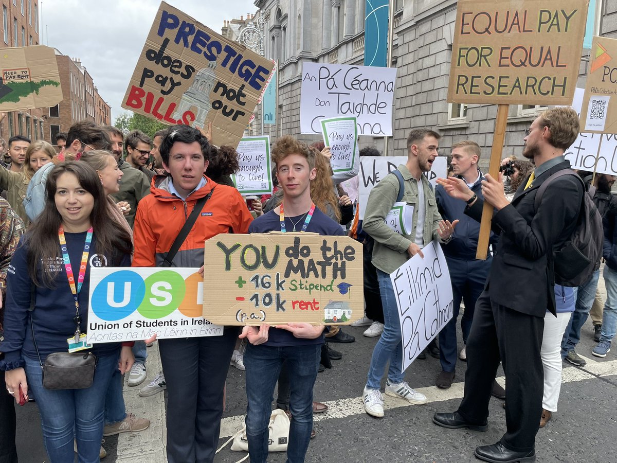 AMLE_Postgrad's tweet photo. Today @TheUSI @pgwa_ie @PhdsPcau @S4C_group and other student unions stand in solidarity with all PhD researchers across Ireland to demand a fair pay of 28,000 for All PhD researchers. https://t.co/abeU1Mqd7D