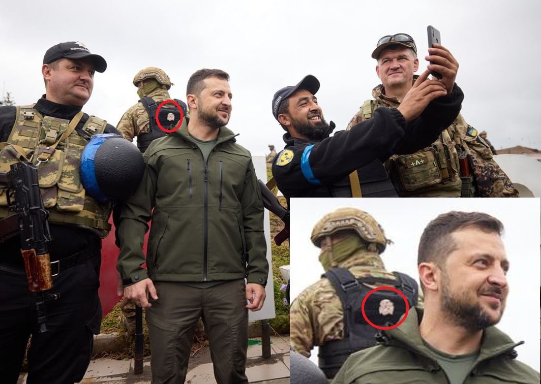 DenisRogatyuk's tweet photo. Zelensky being guarded by a man wearing the SS-Totenkopf (skull and bones) patch has to be the best metaphor for the Ukrainian state.
An oligarchic regime safeguarded by ghouls… https://t.co/RMfmruTWja