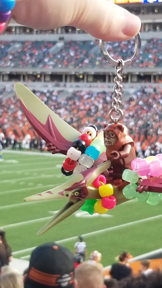 GingerCandE's tweet photo. Took my dino to the Bengals vs Rams game #LostLands2022 https://t.co/yqclZQHgz4
