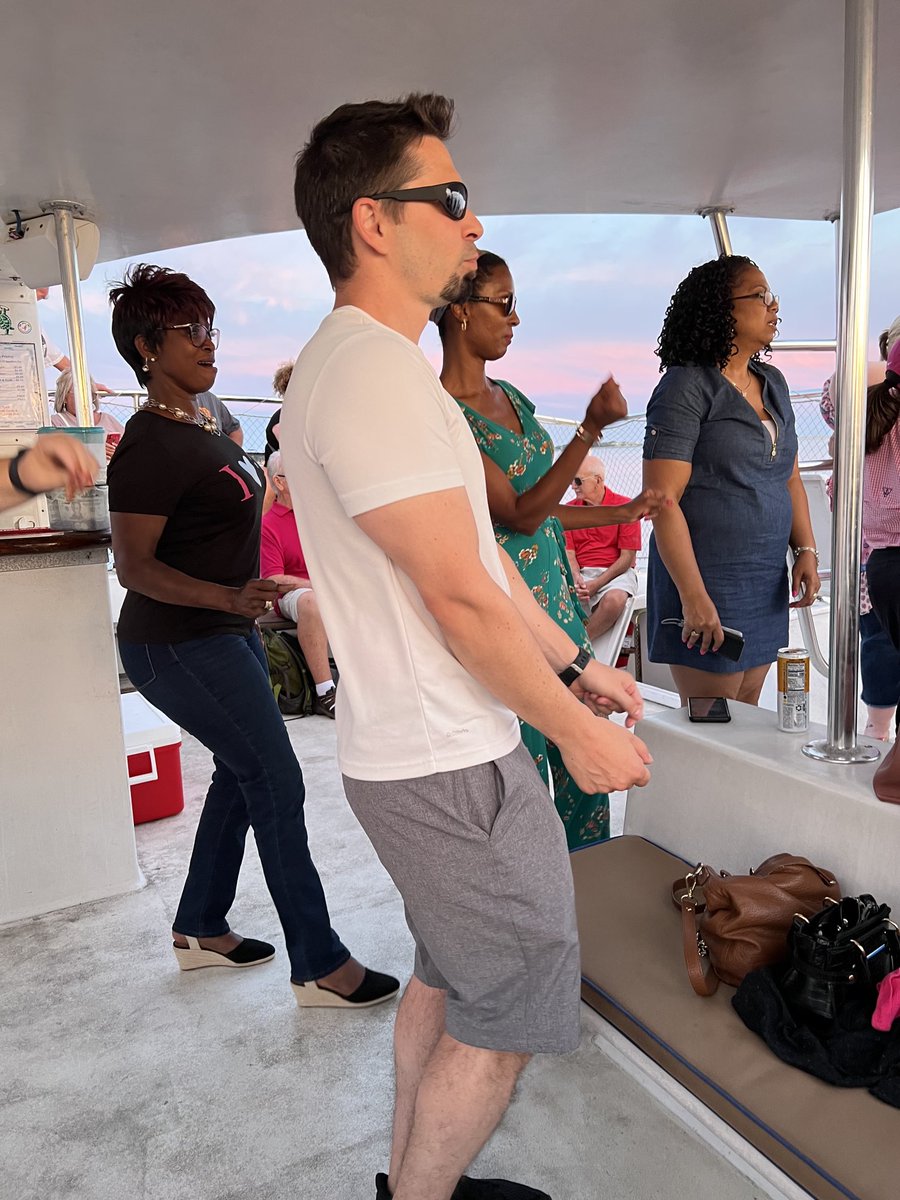 Bonding with our leader on the dance floor . AWESOME time tonight!