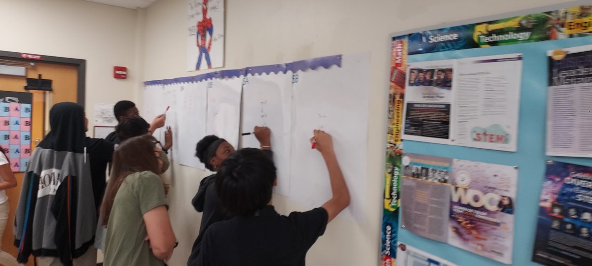MisterWippel's tweet photo. With Math 360 (white boards around the room), students demonstrated their understanding of how to calculate approximations of expressions w/pi and square roots. They were assigned one question, then created one for another student to answer! @IMS_Indians @collierschools https://t.co/Bu7Ra3qoAx