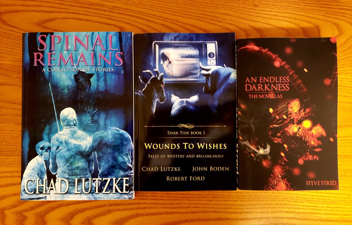 Todays mail call...
Three books by four of my favorites.
SPINAL REMAINS by <a href="/ChadLutzke/">Chad Lutzke 📖 (BRUISES ON A BUTTERFLY out now!)</a>,  WOUNDS TO WISHES by Lutzke, <a href="/JohnBoden1970/">John Boden</a> &amp; <a href="/bobford/">bobford</a> and this behemoth of a novella collection by <a href="/stevestred/">Steve Stred</a>!
I've been looking forward to these and I'm so excited to finally have them.