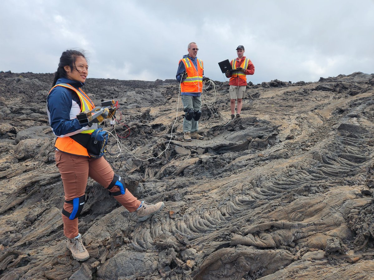 NASAExpeditions's tweet photo. We can’t see it from here, but another giant tunnel lies beneath this lava landscape. The Mag Team is using a portable magnetic field detector to look for telltale signs from above ground. When the team walks over the cave roof, the detector’s readout changes. https://t.co/vTlkEPmDSl