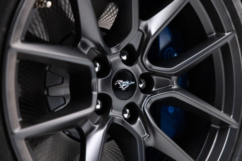 RoadandTrack's tweet photo. The Ford Mustang Dark Horse is the new pony car king. https://t.co/fHvPmLc9p3 https://t.co/b54TcJe7eC