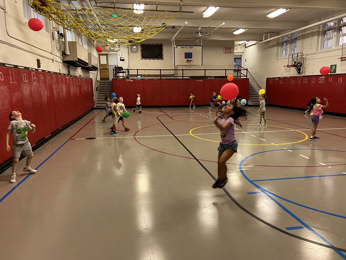 gymlim's tweet photo. May seem like a party in the gym but balloons ALWAYS put a smile on the @NorthSideEW Ss faces. Cooperation could be as simple as using different color balloons = taking turns = waiting your turn. 👍 @EastWillistonSD @djcasano1 @LindsayCafiero @MsRamos_NS #ewlearns https://t.co/AFEOhCLRFJ