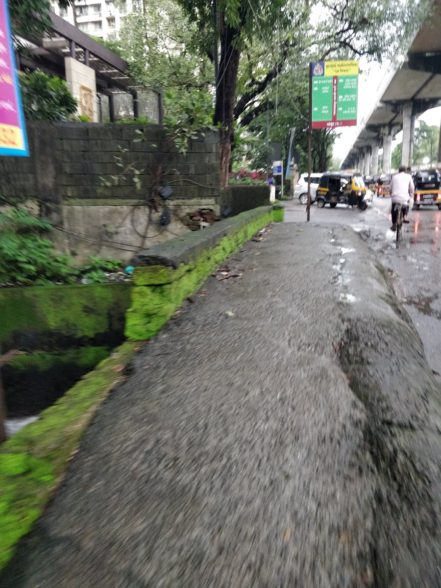 citizen1819's tweet photo. .@mybmc @mybmcWardS This is supposedly a footpath over a huge drain. This is used for walking and unsafe as no barricade towards the drains anyone can fall into the drain and it could be fatal.
Kindly do the needful
Location- Near Runwal forests, Kanjur Marg West 
@mybmcBridges https://t.co/dhvGRc5zVa