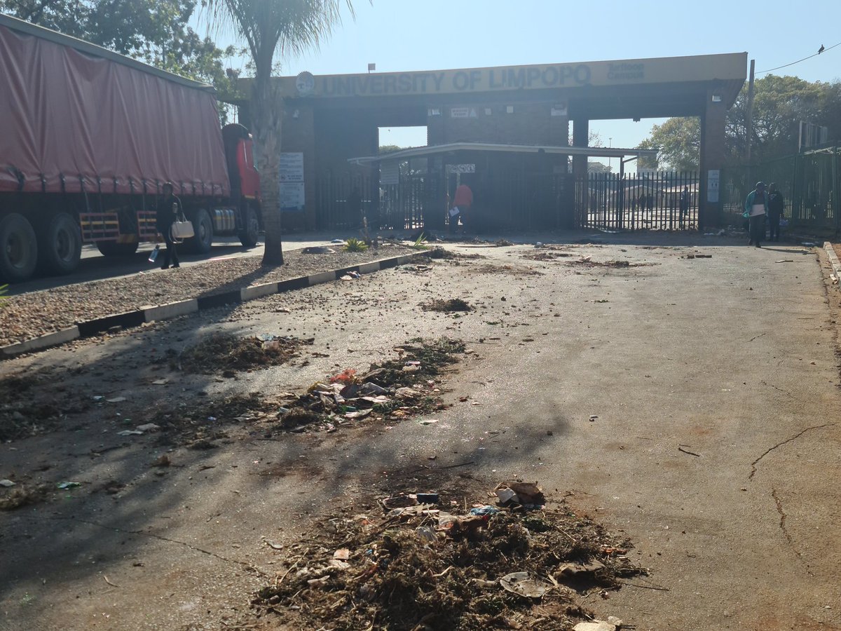 CapricornFMNews's tweet photo. #ULProtest Cleaning operation is now underway. Some of the students are seen leaving campus with their luggage. TMM https://t.co/EOLuYem83L