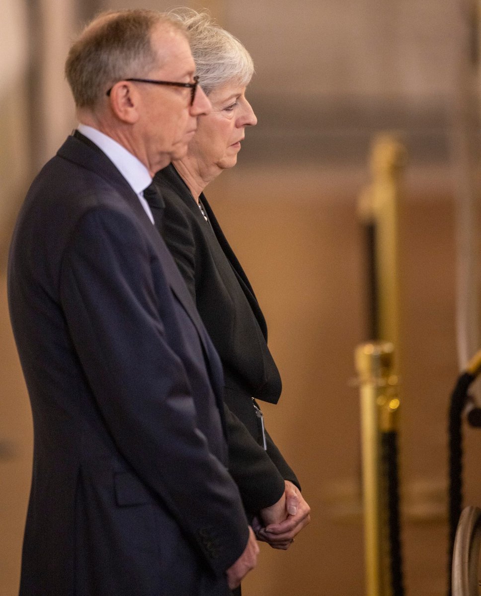 Telegraph's tweet photo. Theresa May and her husband Philip join the public to see Queen Elizabeth II lying in state

https://t.co/HDMmh1vreE https://t.co/eiTfaJRhAA