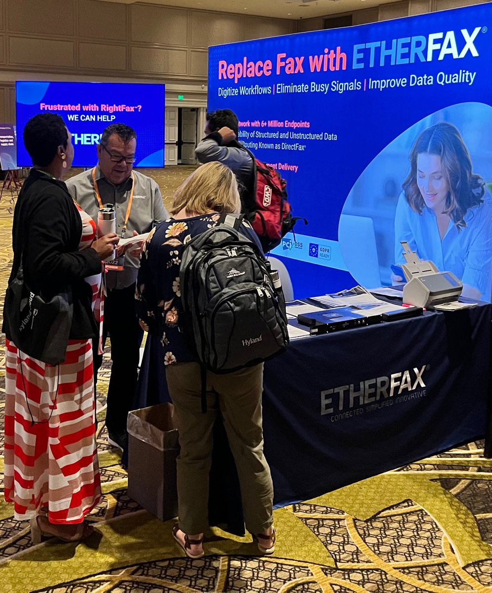 ETHERFAX's tweet photo. We're having a great time meeting everyone at #CommunityLIVE and demonstrating how you can replace fax with etherFAX! Our CEO and co-founder, Paul Banco, even had a chance to paint a portion of the CommunityLIVE mural. 🎨 @Hyland @pauliebanks https://t.co/odvOlGNPwv
