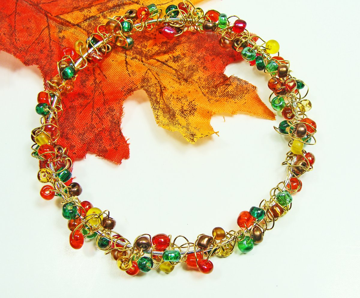 girliegals12's tweet photo. Colorful Autumn Multi-Color Wire Crocheted & Wire Wrapped Goldtone Bangle: https://t.co/eLgx5oG6t8 #beadedbracelet #banglebracelet #autumnjewelry #fallcolors #glassseedbeads #orange #red #green #teal #topaz #wirecrochet #wirewrapped #jewelryforher #etsyhandmadejewelry #shopsmall https://t.co/PXakmZN9zd