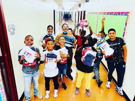 BxPs70's tweet photo. 5th graders excited to receive their free uniforms. Wear them proudly! ❤️🤍❤️ https://t.co/SoagXweL04