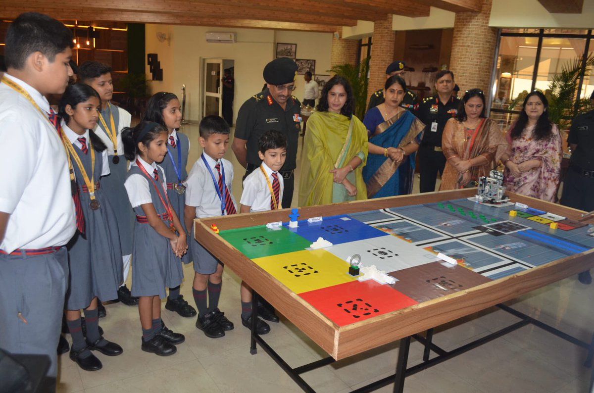 PRODefPune's tweet photo. GOC #SudarshaChakraCorps felicitated the teams of #ArmyPublicSchool #Bhopal for winning Girls under 19 Football tournament, Karate Team for outstanding performance in #SCKFI, State Karate Championship & for winning bronze medal in @WROOfficial https://t.co/zG6WGEECn0