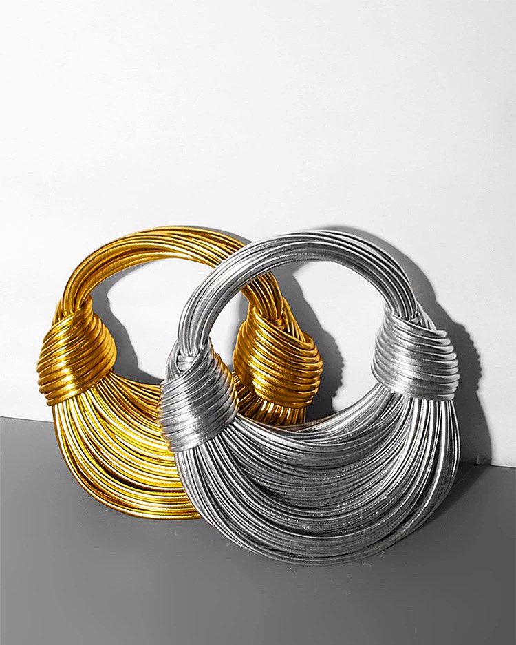 clemenceFH's tweet photo. Nouèe Hand-Bag is an Iconic statement bag with polished leather cords construct with two oversized knots , made entirely out of tubular leather strips complete with Gold/ Silver Hardware zips that adds a pop of color against the colored leather body❤️‍🔥❤️‍🔥 
Available in now 🥰 https://t.co/TQmMi4OTx1