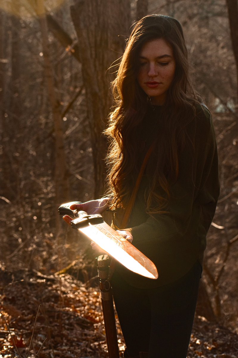 Cedarlore's tweet photo. A bronze sword of giant-slaying lore that I forged, ground, and carved years ago for a film production, wielded and showcased by my beautiful girlfriend Chloe Bensinger. Still to this day it’s one of my favorite pieces! #swords #bladesmithing #fineart #metalsmithing #fantasyart https://t.co/CbxpnIZF2M