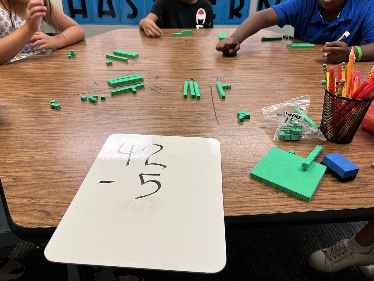 Look Subtracting with regrouping with green base ten blocks! Now adding ten to the ones makes sense! @HasslerKISD @kloneal2 @KleinISDMath