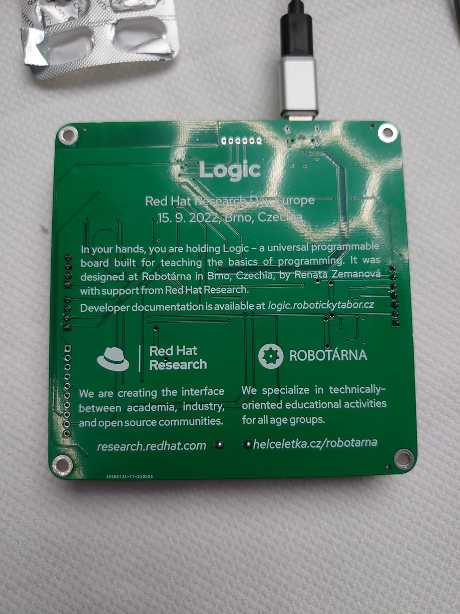 I was lucky enough to win this very cool gadget at #RHResearchDay today in Brno, Czech Republic! 😍 It's a locally-designed ESP32-based educational board with lots of NeoPixels, beeper and controls. I think it'd make a pretty cool Tenori-on. Děkuji, @redhatcz! 🇨🇿