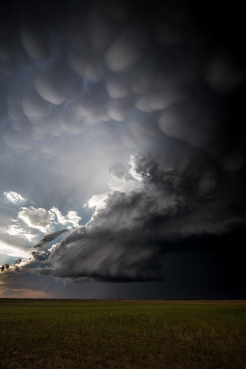 Twisty cloud with puffy clouds
