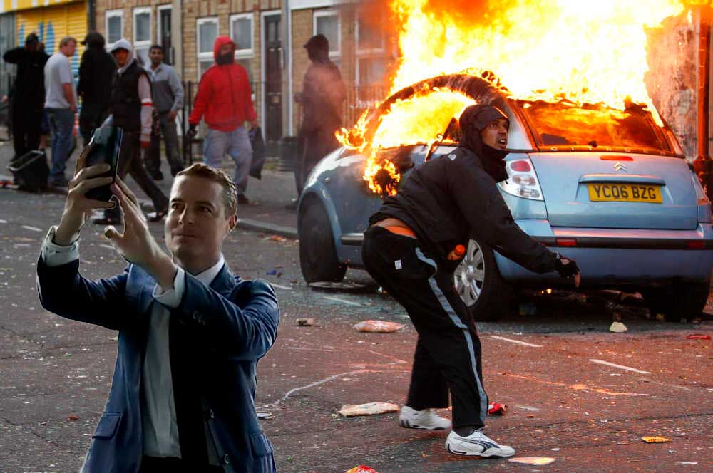 MrUKhackz's tweet photo. @RacingTV #FunWithFran at the London Riots https://t.co/95c1CHVsQK