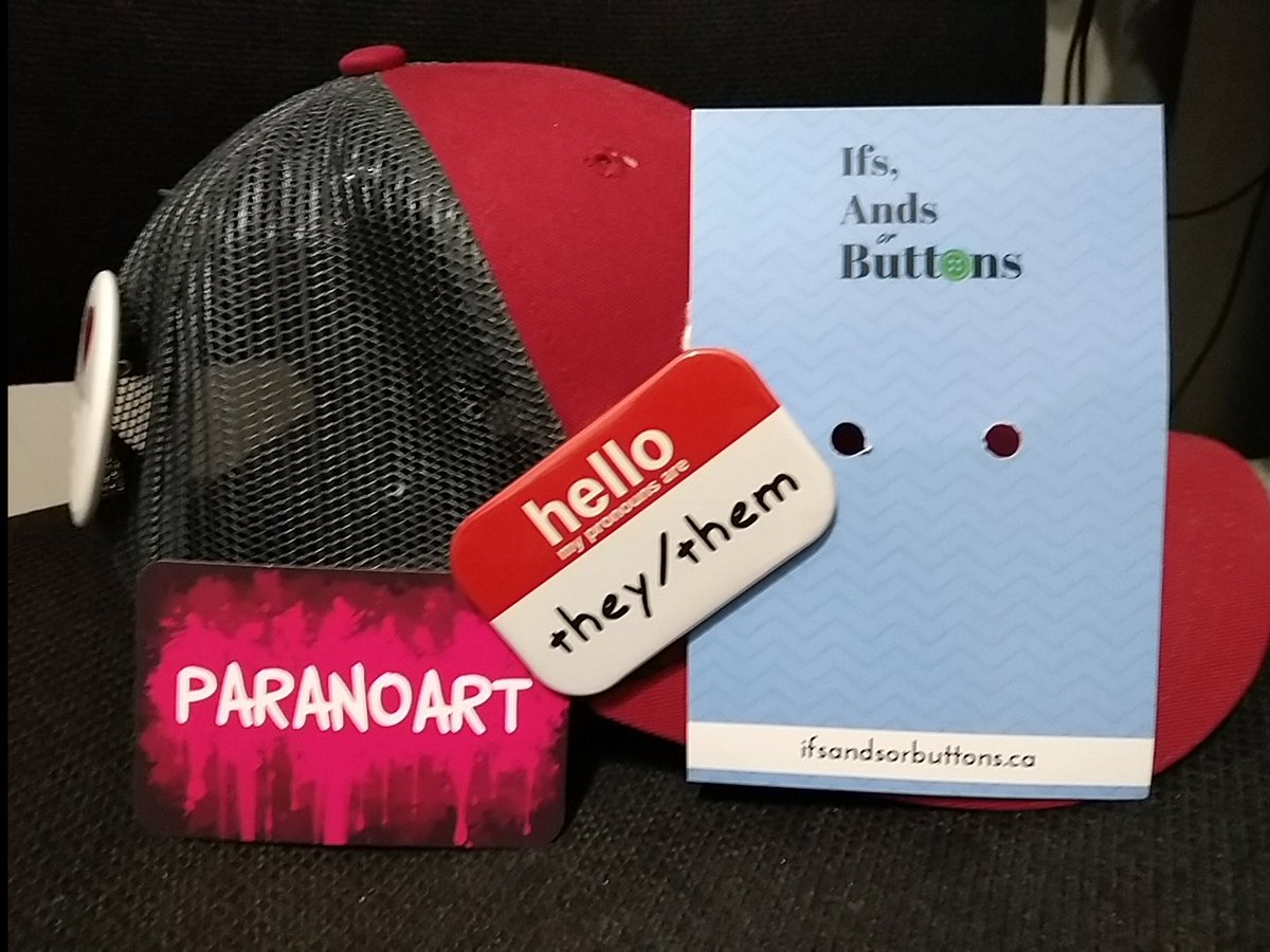 ErinTenelle's tweet image. I&apos;ve attached my new pins to my work hat from @IfsAndsOrButton to help me communicate not only my own pronouns but also that my workplace is intended to be a safe space!! Going with my pride and ace pins by @ParanoArt ! I&apos;ll leave comments on Etsy after work,these are 👌 perfect.