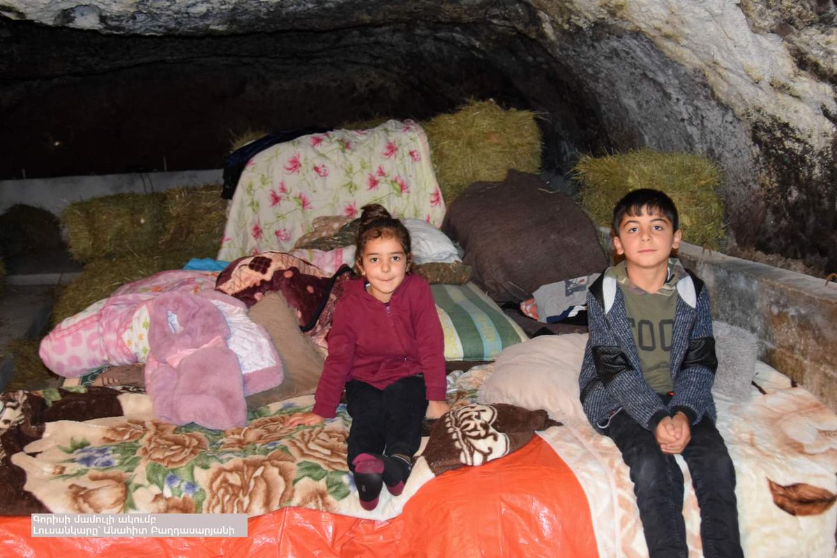 #Armenian children hiding in the cave under shelling of #Azerbaijan heavy artillery. Azerbaijan dictator Aliyev bombing peaceful Armenian cities

photo credit: Goris Press Club 
#Armenia