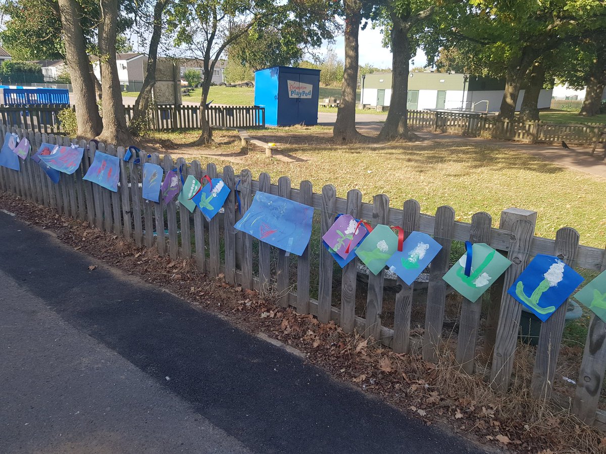 It was a bit windy this afternoon  (!) but the flowers for the Queen are all out. Thank you to out families for adding ribbons. 
We hope the flowers survive the night. Please do find Mr Kieran on the playground in the morning for more ribbon.