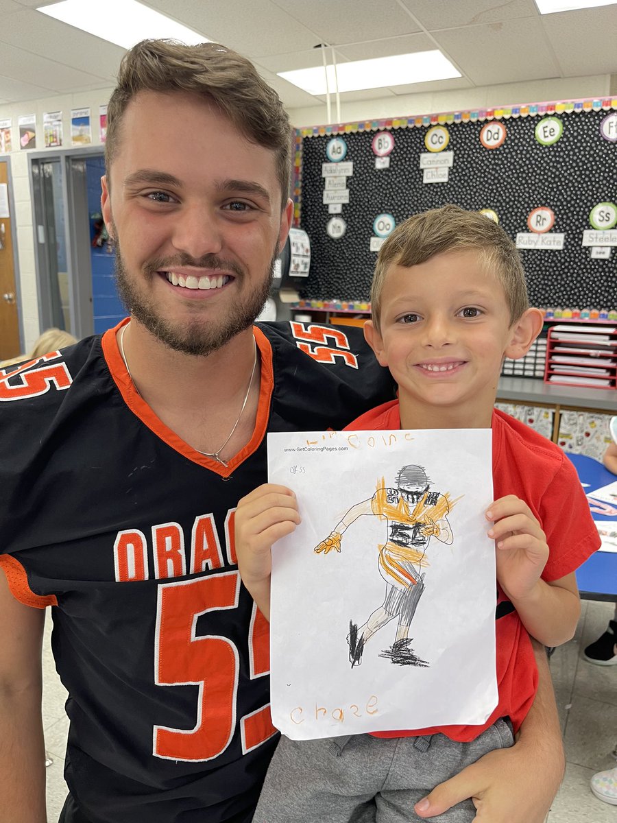 DanJenkins23's tweet photo. Love seeing our guys read books to our kids! Big #55 read “Me and my Dragon” to my son’s class today! #OneClinton #DPOD https://t.co/4ZvC0wPrZ5