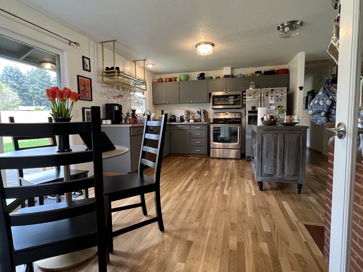 JenThario's tweet photo. @marcuslemonis We’re still rocking the 1963 plywood cabinets (with yet another coat of paint) It takes two hands to close the upper doors because you have to line them up.  We use the linen closet for a pantry. Help finish our kitchen!  #TheRenovatorHGTV https://t.co/ytIFVZTTpX
