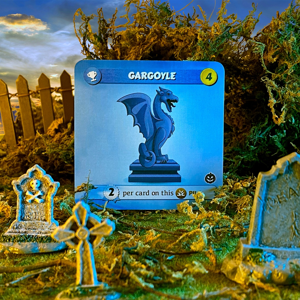 GadaboutGames's tweet photo. Holding a vigil atop a lofty pile of cards, the higher the Gargoyle's perch, the greater your rewards will be.

#turfwargame #halloween #gargoyle #kickstartergames #boardgames https://t.co/8g0aRTi8S3