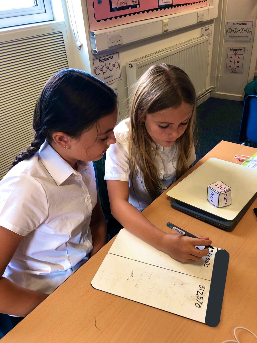 KPSFeed's tweet photo. #KPSYear5 put their place value knowledge to test today as they played a game of βLargest Numberβ against their partner. They were all superb at working out 10, 100, 1,000, 10,000 and 100,000 more or less of a starting number. Well done Year 5! #KPSMaths #Fun #Determined https://t.co/gusflzIGch