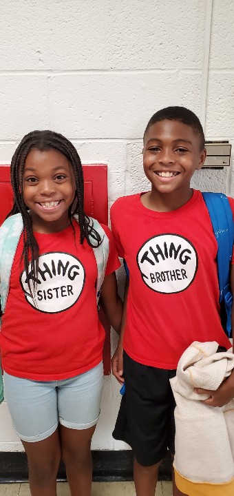 It's Red Thursday and <a href="/Chiefs/">Kansas City Chiefs</a> home opener. Love siblings' shirts!