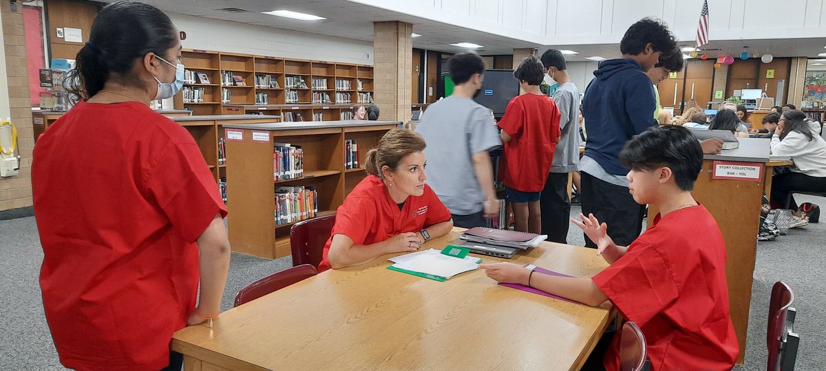 rvabmdavis's tweet photo. Medical Center kids and director doing research in their scrubs today. @godwin_library @hcpslib @suzannestockman @Godwin_students #21stcenturylearning https://t.co/HgtgGy1SsW