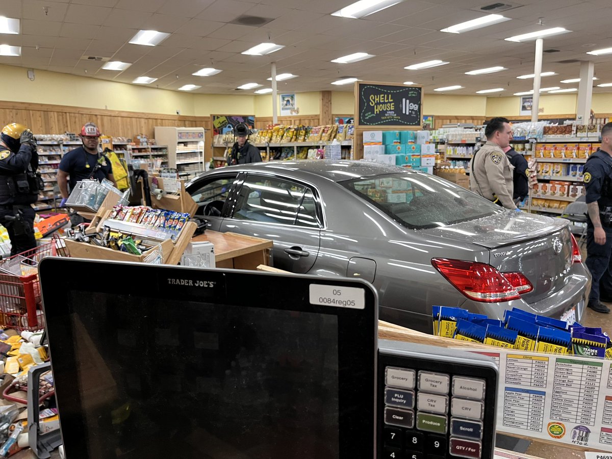 AlamedaCoFire's tweet photo. ACFD is currently on scene of a vehicle inside Trader Joes Market on Redwood Road in Castro Valley. Crews are currently assessing the building for hazards and injured persons. This is a developing situation, and more information will be released later. https://t.co/doQHdlf2rV