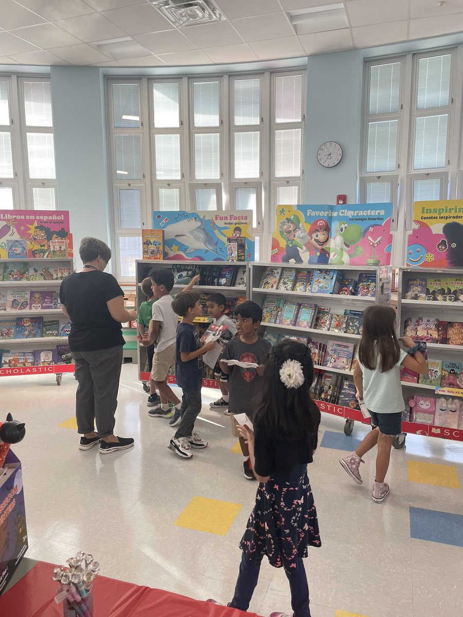 Ms_Paradiso's tweet photo. Mrs. Cormack’s first grade classroom at the book fair yesterday morning!📚 We can’t wait for our learners to read their new books. #mineolaproud https://t.co/TekFcl1pZY