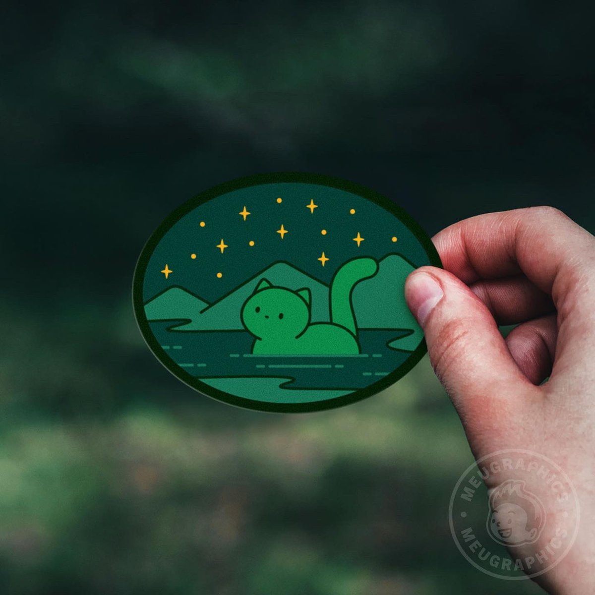 Meugraphics's tweet photo. The Loch Ness kitty vinyl sticker ! Now available! #stickershop #vinylstickers #lochness #cryptids #illustration https://t.co/f3Mb0OnUHq