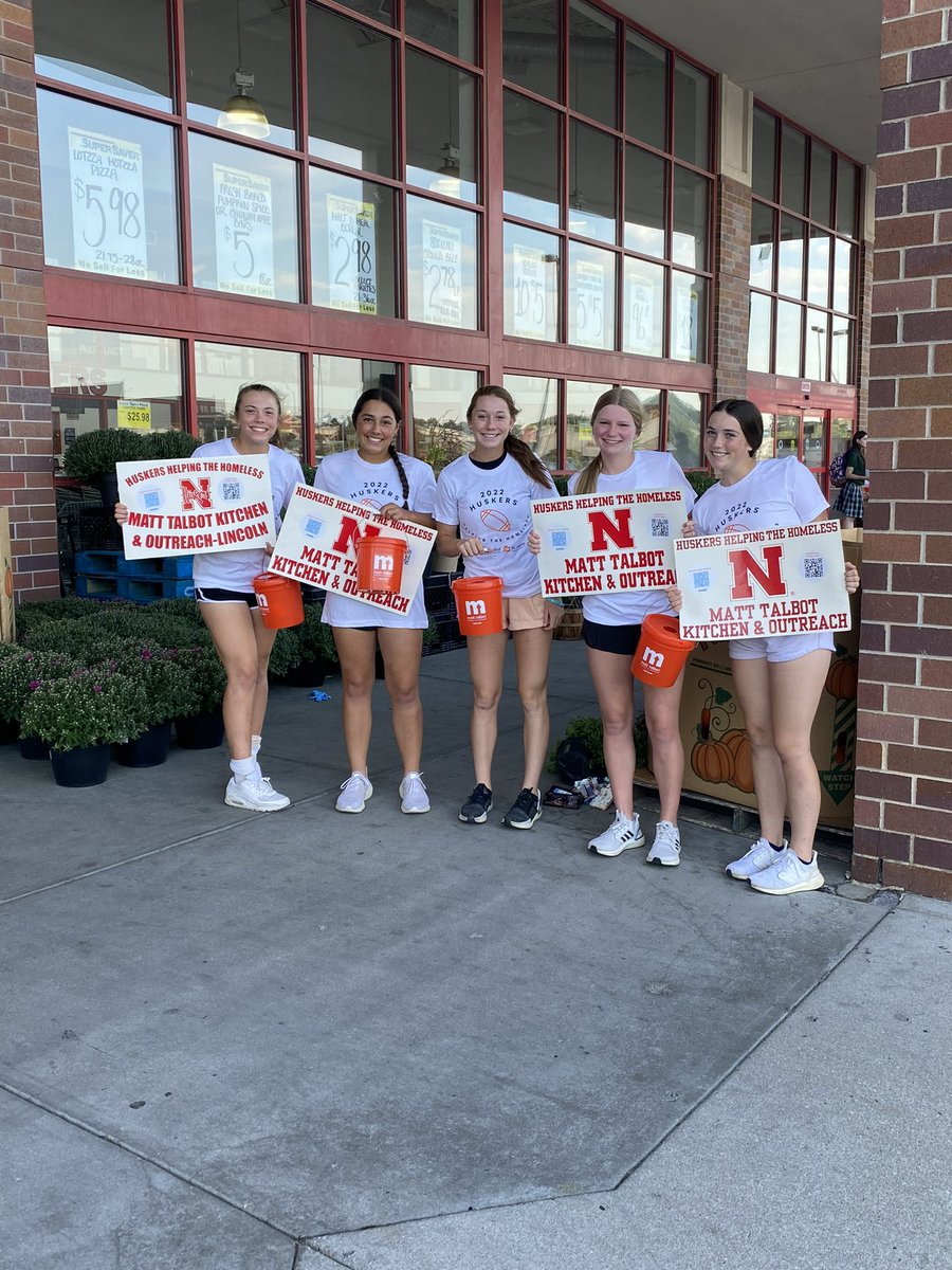 LSW softball student athletes participating in Huskers Helping the Homeless. #MoreThanAGame