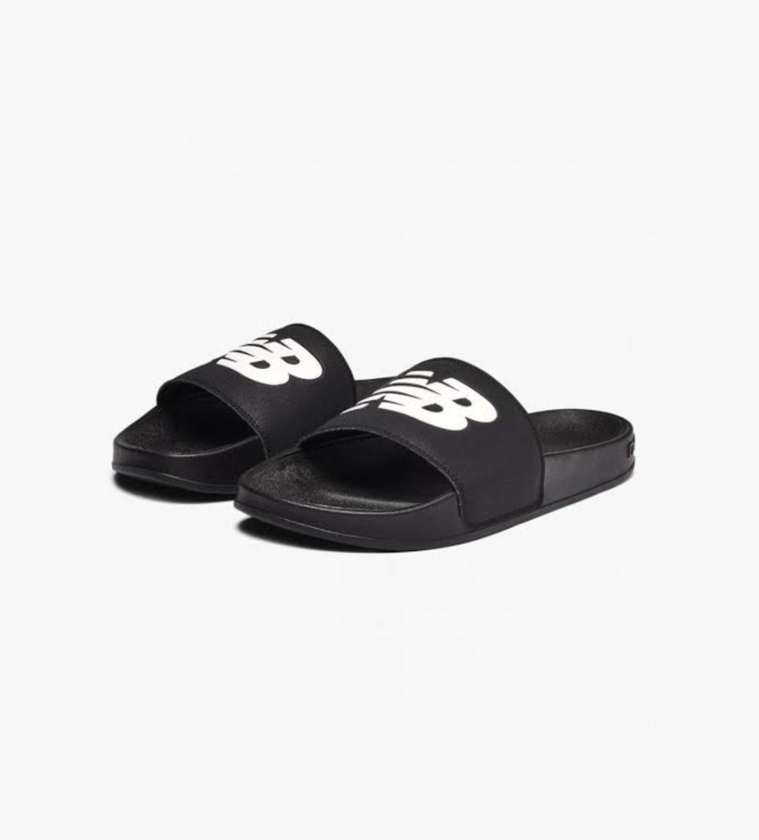 Taehyung wearing the same slippers.