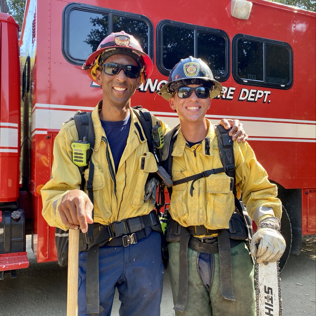 LAFDFoundation's tweet photo. FIREFIGHTER APPRECIATION MONTH 🔥
#LAFD Engineer Brandon Blue (left) with his son Elijah, a chainsaw operator for Crew 3.
This father + son duo were all smiles after chainsaw training off the Natoma Trail.
#LAFDappreciation #LAFDfoundation #LosAngelesFireDepartment https://t.co/1nsZY1MjKE