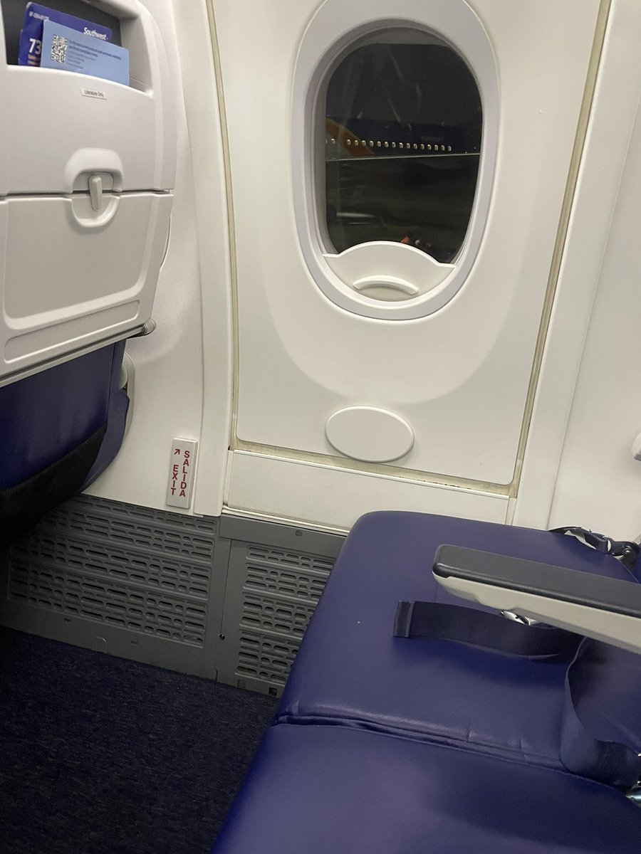 Happiness is flying home on a half empty plane. While sitting in an empty exit row. 😊