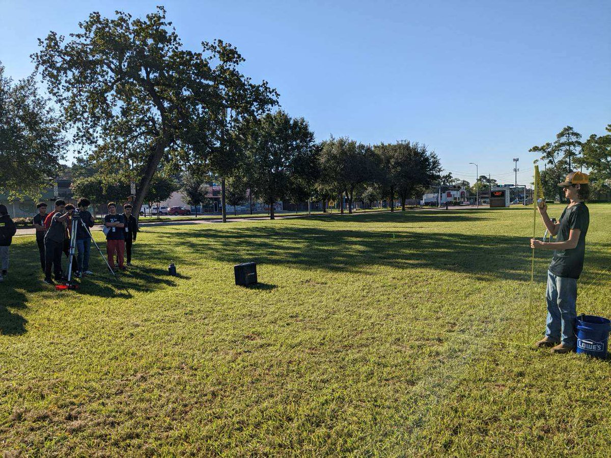 CoachPearce2's tweet photo. Students surveying with a builders level. @SpringWoodsHigh @cte_sbisd https://t.co/vPVhI6EWko