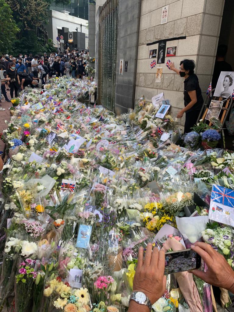 FCDOGovUK's tweet photo. Sympathy and respect – floral tributes left at UK Embassies and Missions for Her Majesty The Queen. https://t.co/dt2Bf3FluO