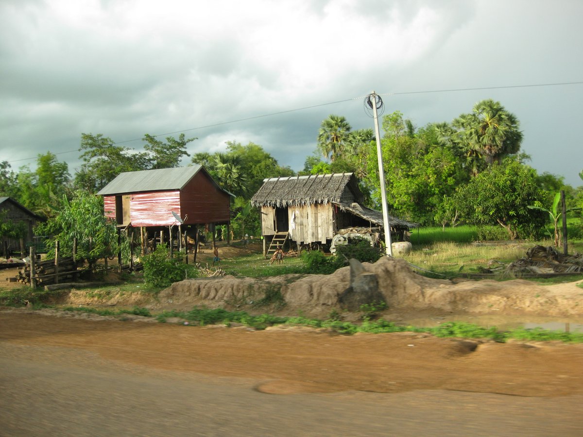 Traditional village houses we saw while journeying through Cambodia - we did a couple Homestays along the way too!