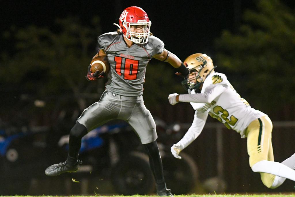 Oak Hills Shane Young eludes a St Bonaventura defender as Young returned a punt for a touchdown on Thursday night. (James Quigg for the Daily Press) <a href="/OakHillsFootba1/">Oak Hills Football</a> <a href="/OHHS_FB_Booster/">OHHS FB Booster</a> <a href="/DPSports/">Daily Press Sports</a> #football #hdpreps