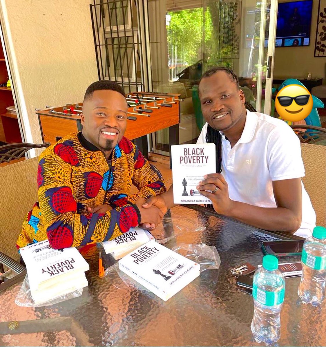 TownshipPress's tweet photo. #FridayMOJO inspired by Prof. Musa Manzi (Wits) who when travelling to Serbia - chose great reading company. He bought 10 copies of #BlackPoverty that will be shared with young people across South Africa. This will be done through his Foundation. It always takes a community. ✊🏾🙏🏾 https://t.co/7mqHrumqe3
