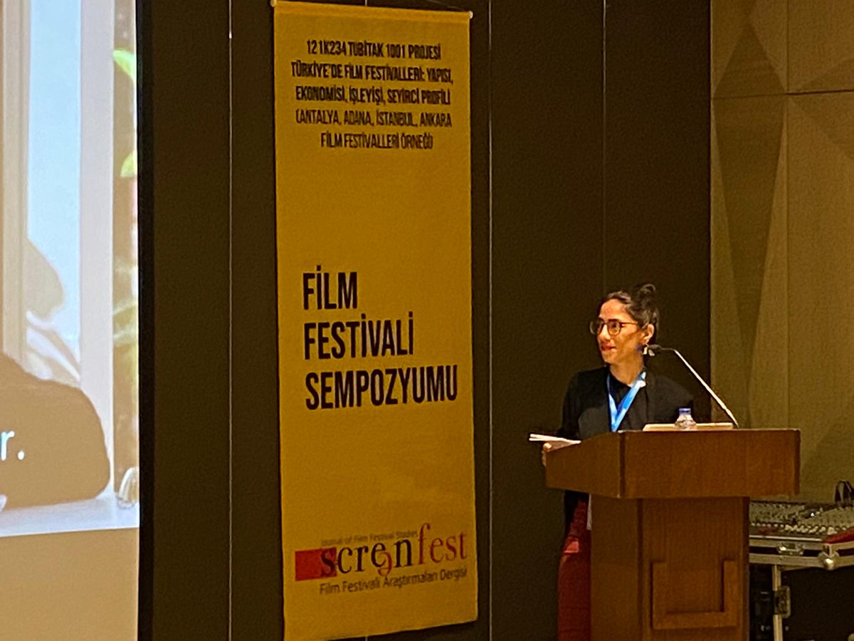 filmfestivalsym's tweet photo. Galatasaray Üniversitesi'nden Ece Vitrinel'in, "Nedir Bu “Festival Filmi” Denen Garabet? İmkânsız Bir Tanım Üzerine Düşünceler" başlıklı sunumuyla altıncı oturuma devam ediyoruz. @altinkozaff @screenfestjrnl #filmfestivalsymposium2022 #symposium2022 #screenfest https://t.co/SE9U5UuVPg