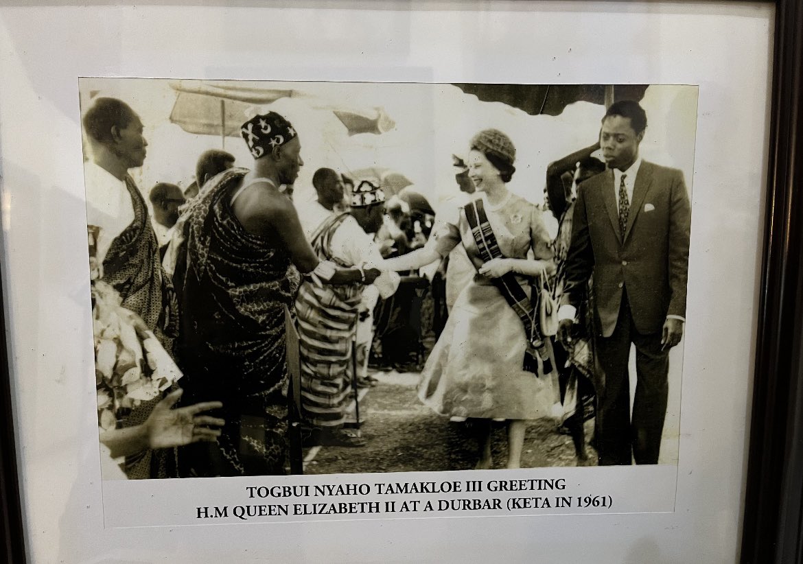 LovelaceOdoi's tweet photo. This is a photo I took a couple of months ago on the wall of my grandfather’s home when visiting my mother’s hometown in Keta, Ghana. 

Her Majesty the Queen had a selfless devotion to her duties which was felt by people in the UK, Commonwealth and all around the world. #Queen https://t.co/frR2TtgKQS