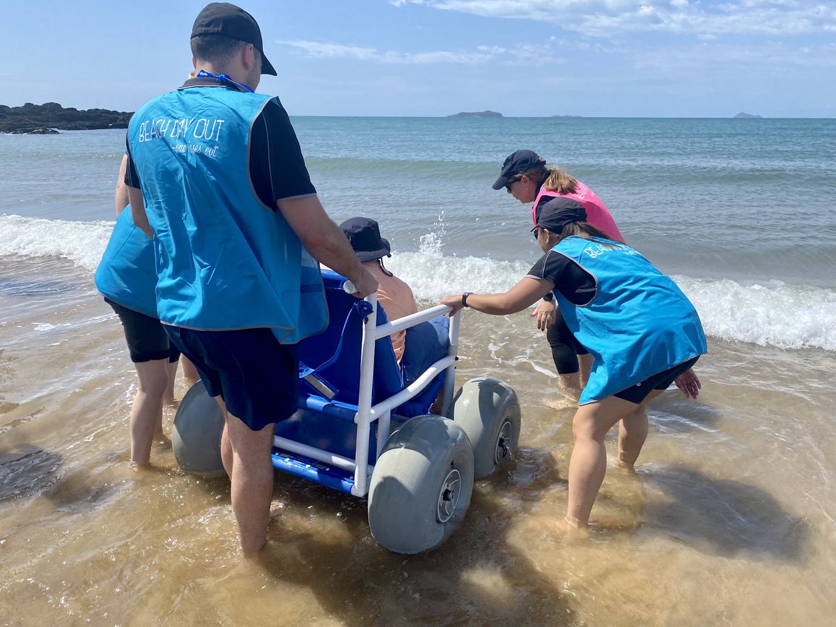 vanesaboch's tweet photo. Today our CQUniversity Physiotherapy, Occupational Therapists and Speech Pathology students volunteered their time to assist people of all abilities and all ages to access the beach and have a great time at Beach Day Out 2022 in Emu Park! Many smiles were found! https://t.co/9Rj9mraZnl