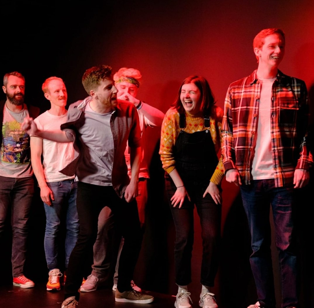 From our first onstage performance together!! This isn't a "flattering photo" but dammit can't a woman laugh at her friends faux-rage.

Phil (to the left of conleth) will also be performing twoprov, but not w us!! We are excited to watch him and Cormac too!!